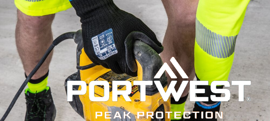 Trabalhador que usa luvas antivibração Portwest enquanto opera um martelo pneumático amarelo. O logótipo branco da Portwest com a palavra "Peak Protection" é apresentado em primeiro plano.